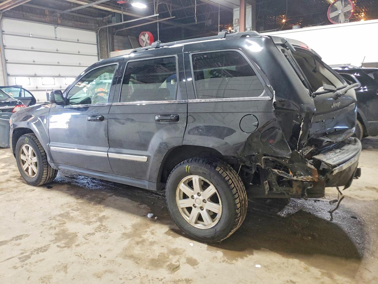 2009 Jeep Grand cher VIN 1J8HR58P69C550895 photo 2