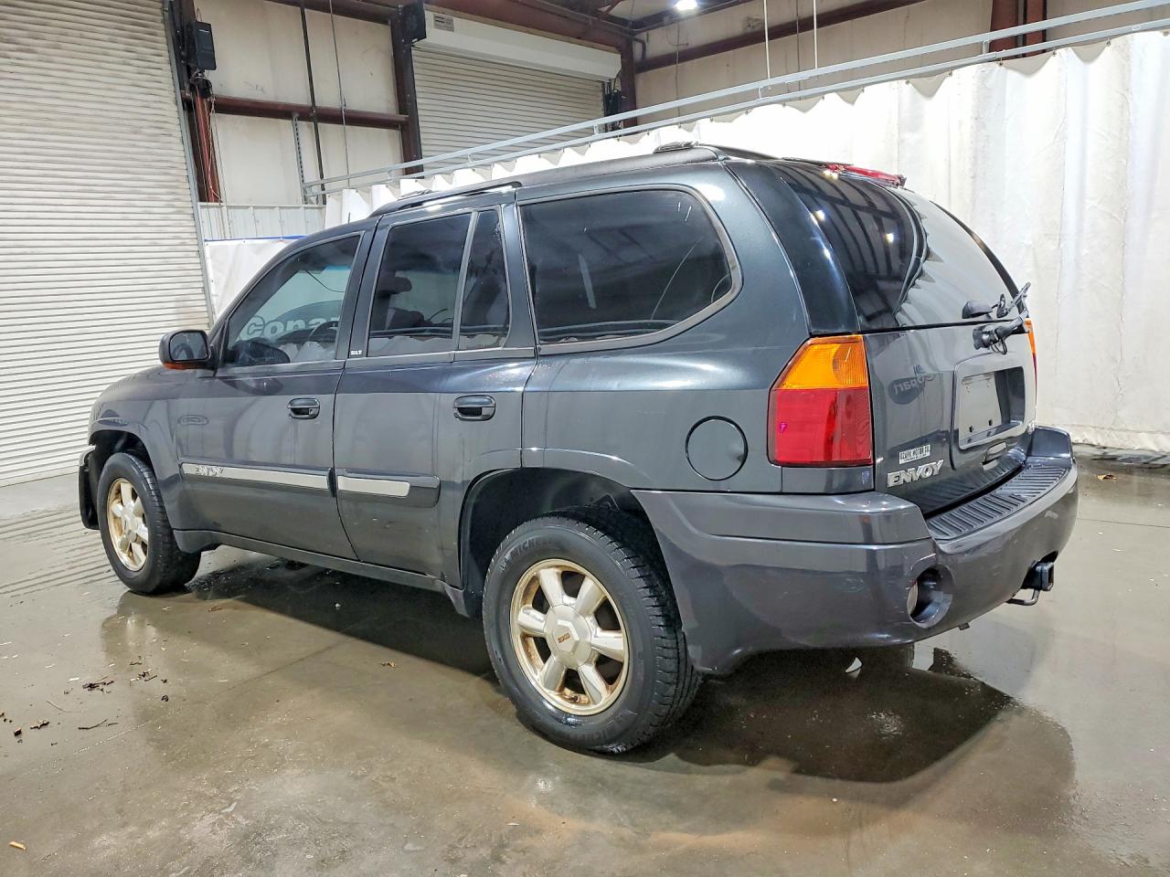 2005 GMC Envoy VIN 1GKDT13S152302912 photo 2