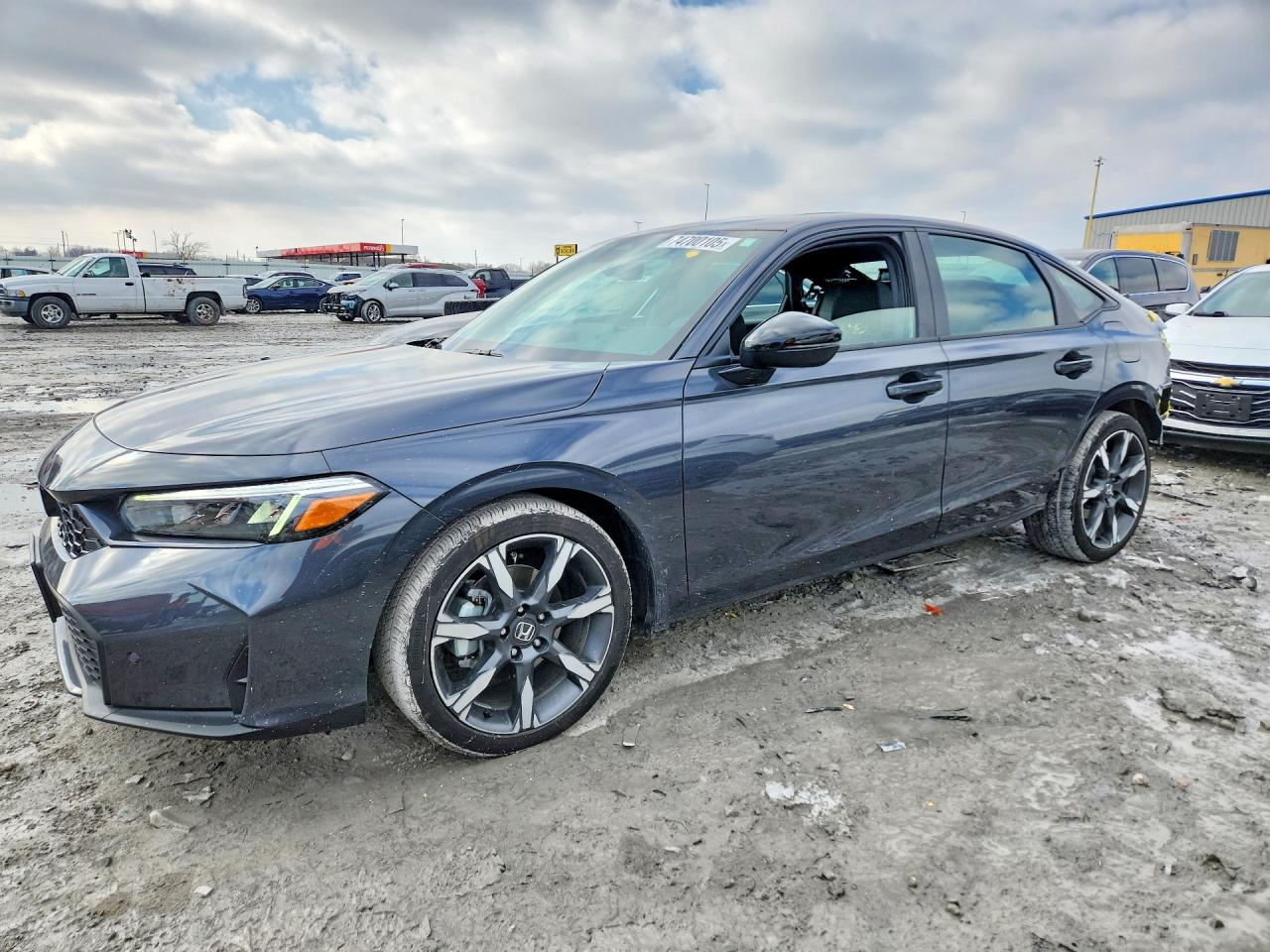 2025 Honda Civic VIN 2HGFE4F84SH322320 photo 1