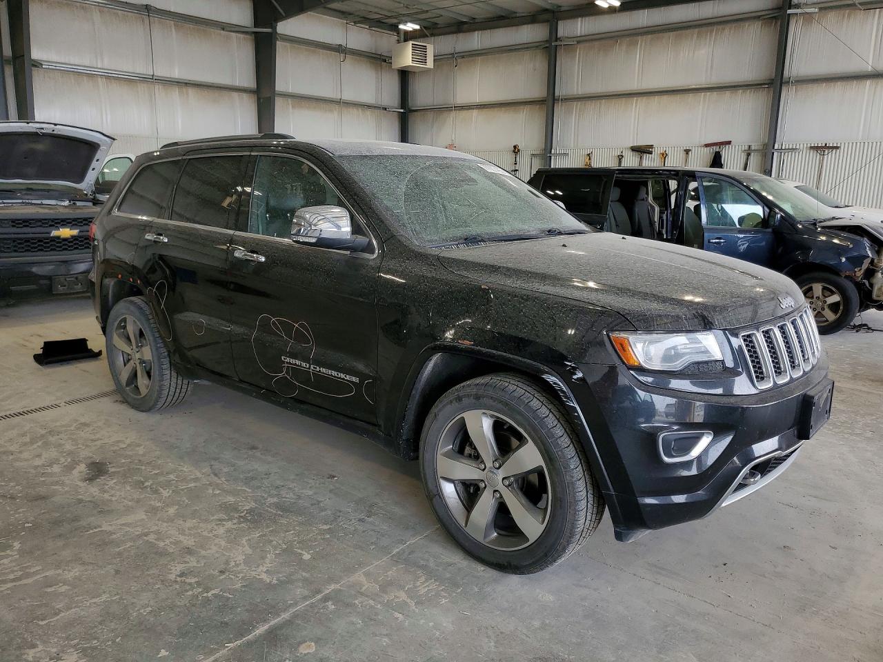 2014 Jeep Cherokee VIN 1C4RJFCG9EC272634 photo 4