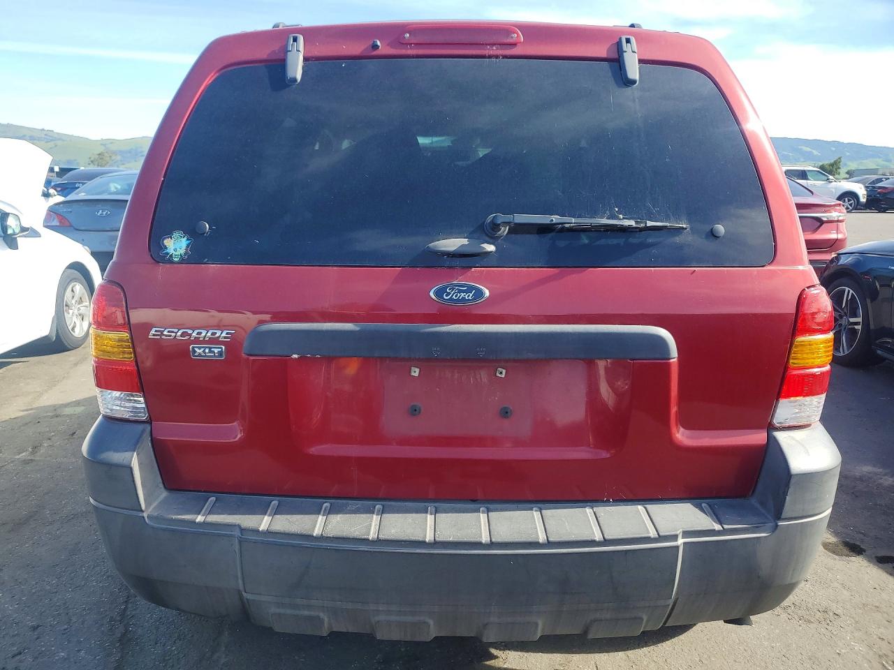 2005 Ford Escape VIN 1FMYU93105KA70752 photo 6
