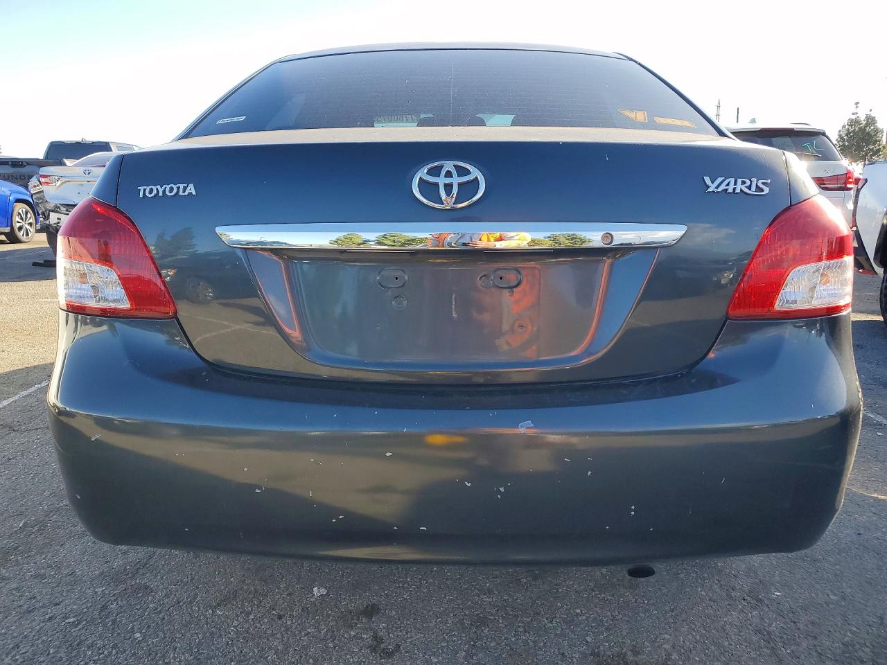 2011 Toyota Yaris VIN JTDBT4K34BL000907 photo 6