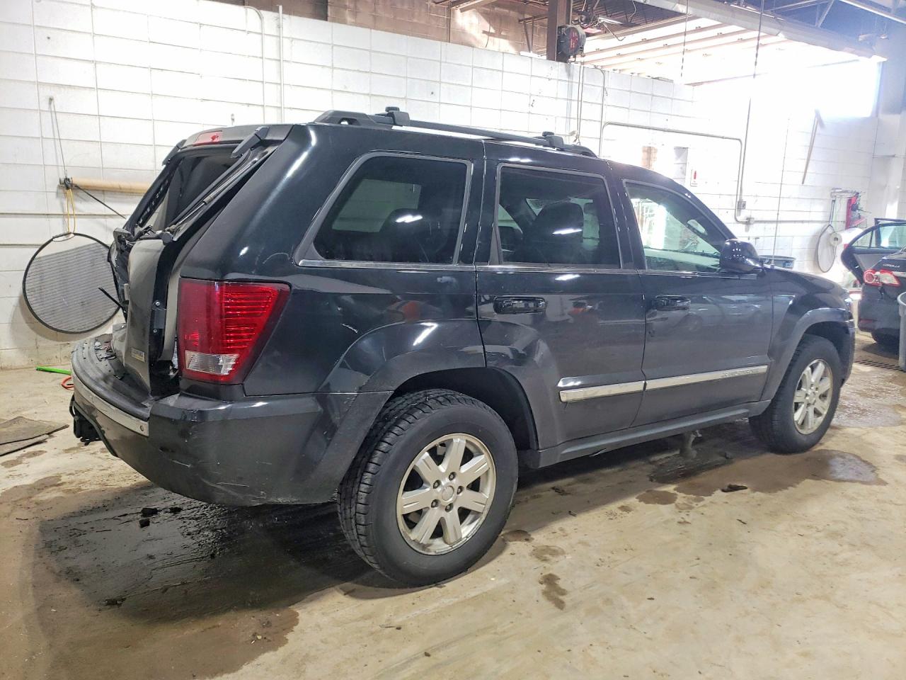 2009 Jeep Grand cher VIN 1J8HR58P69C550895 photo 3