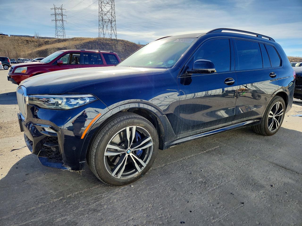 2019 BMW X7 VIN 5UXCX4C52KLS38665 photo 1