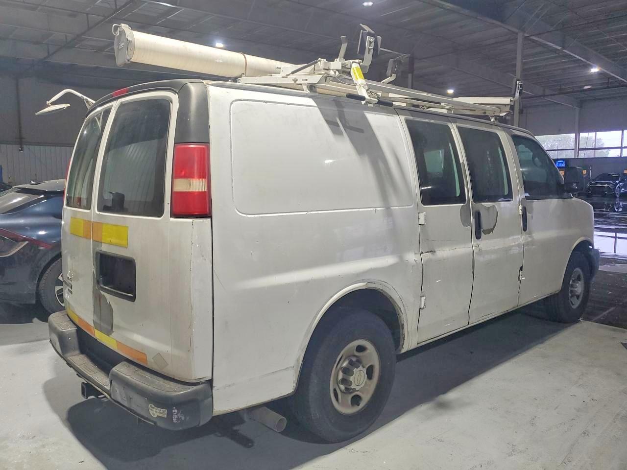 2012 CHEV Express VIN 1GCWGFCB8C1123713 photo 3