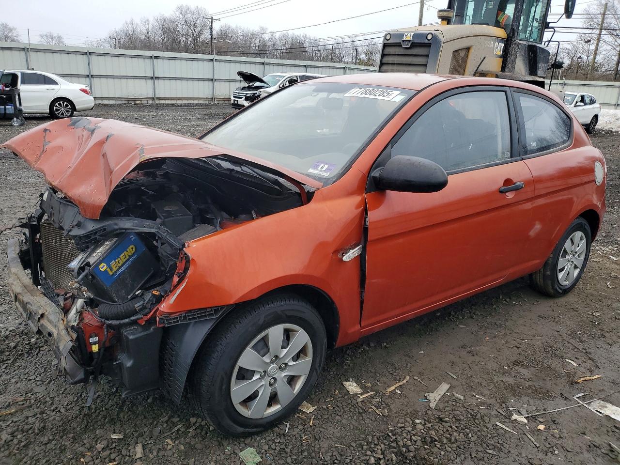 2009 Hyundai Accent VIN KMHCM36C09U120161 photo 1