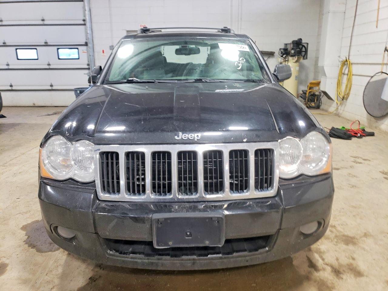 2009 Jeep Grand cher VIN 1J8HR58P69C550895 photo 5
