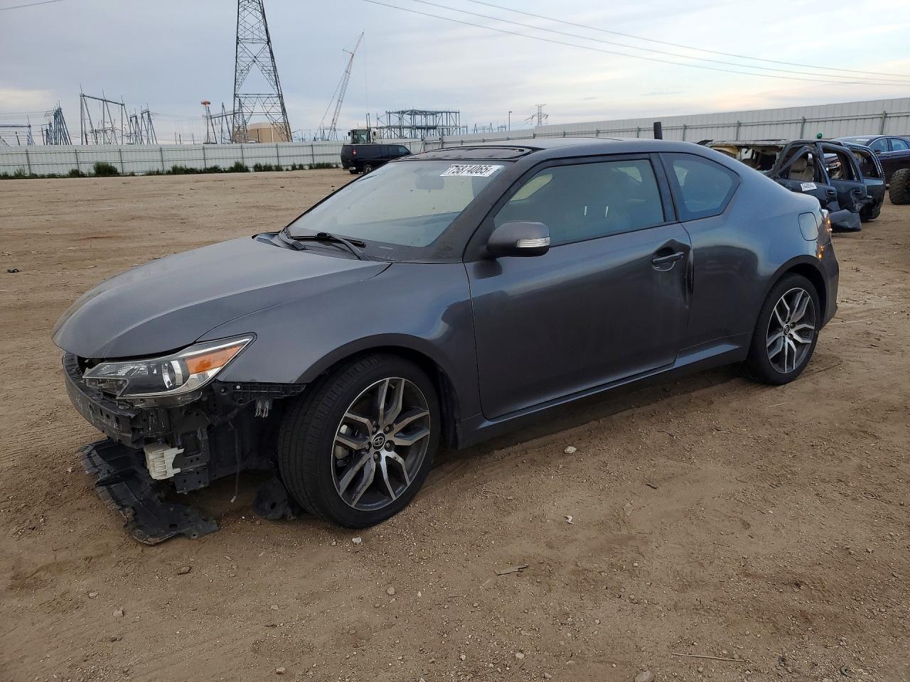 2015 Toyota Scion VIN JTKJF5C76FJ010648 photo 1