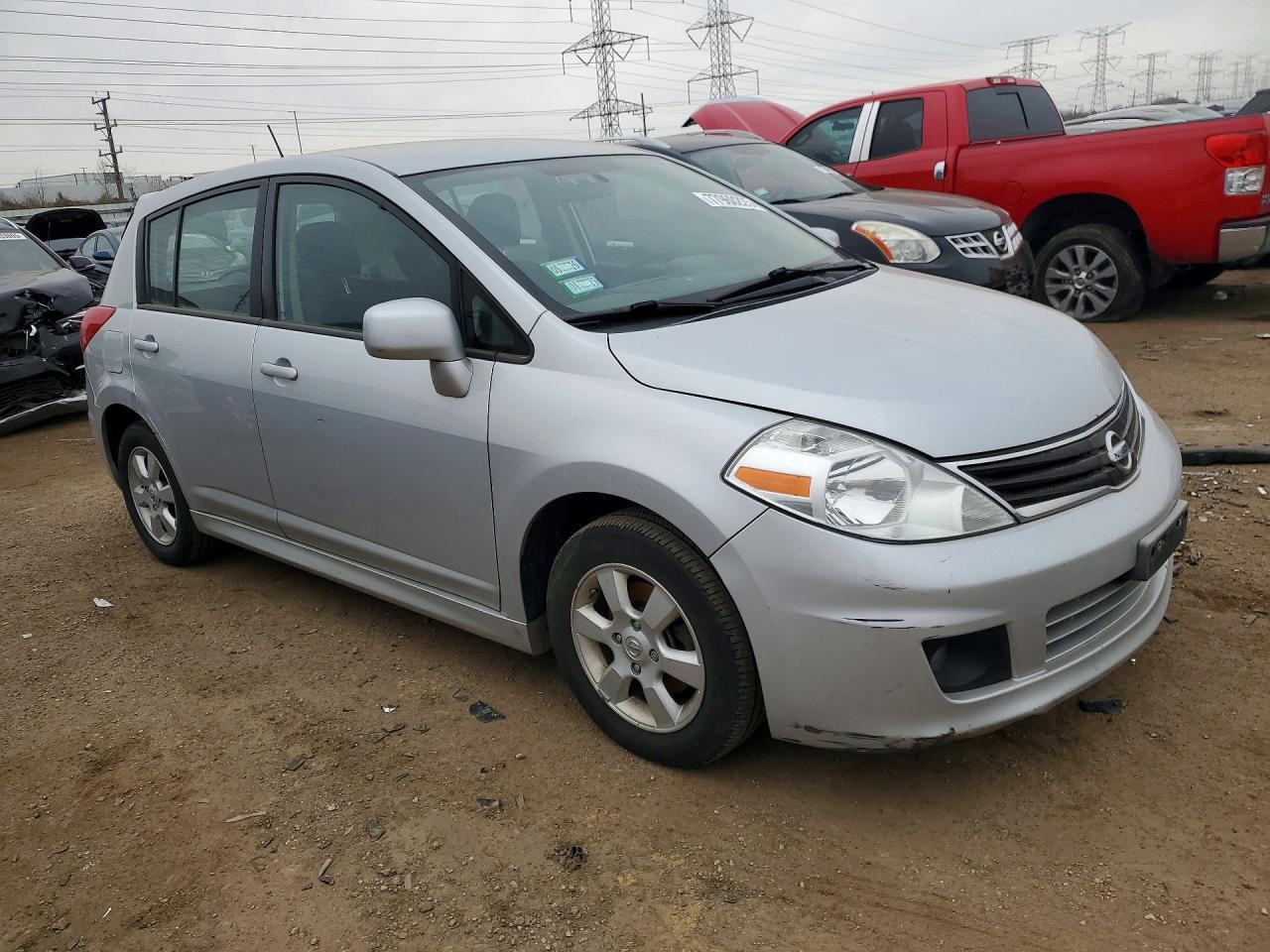 2010 NISS Versa VIN 3N1BC1CP0AL385601 photo 4