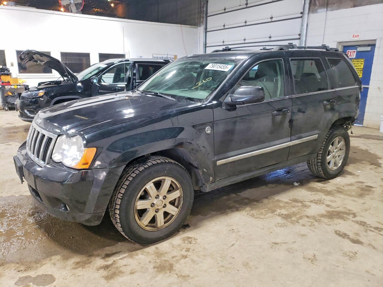2009 Jeep Grand cher VIN 1J8HR58P69C550895 photo 1