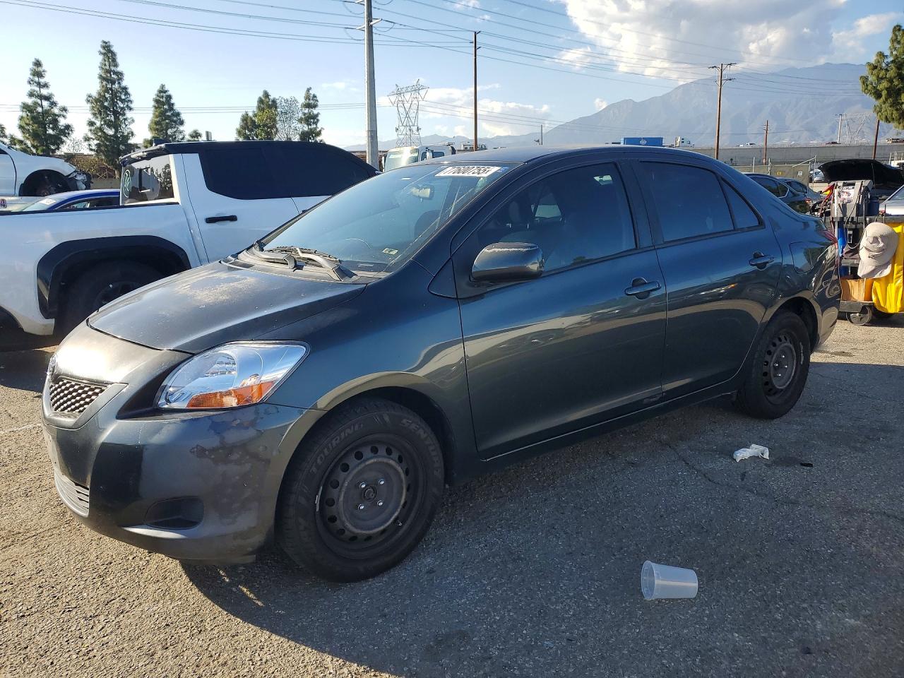 2011 Toyota Yaris VIN JTDBT4K34BL000907 photo 1