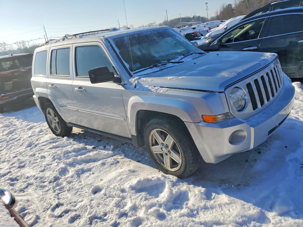 2010 Jeep Patriot VIN 1J4NF4GBXAD501680 photo 4