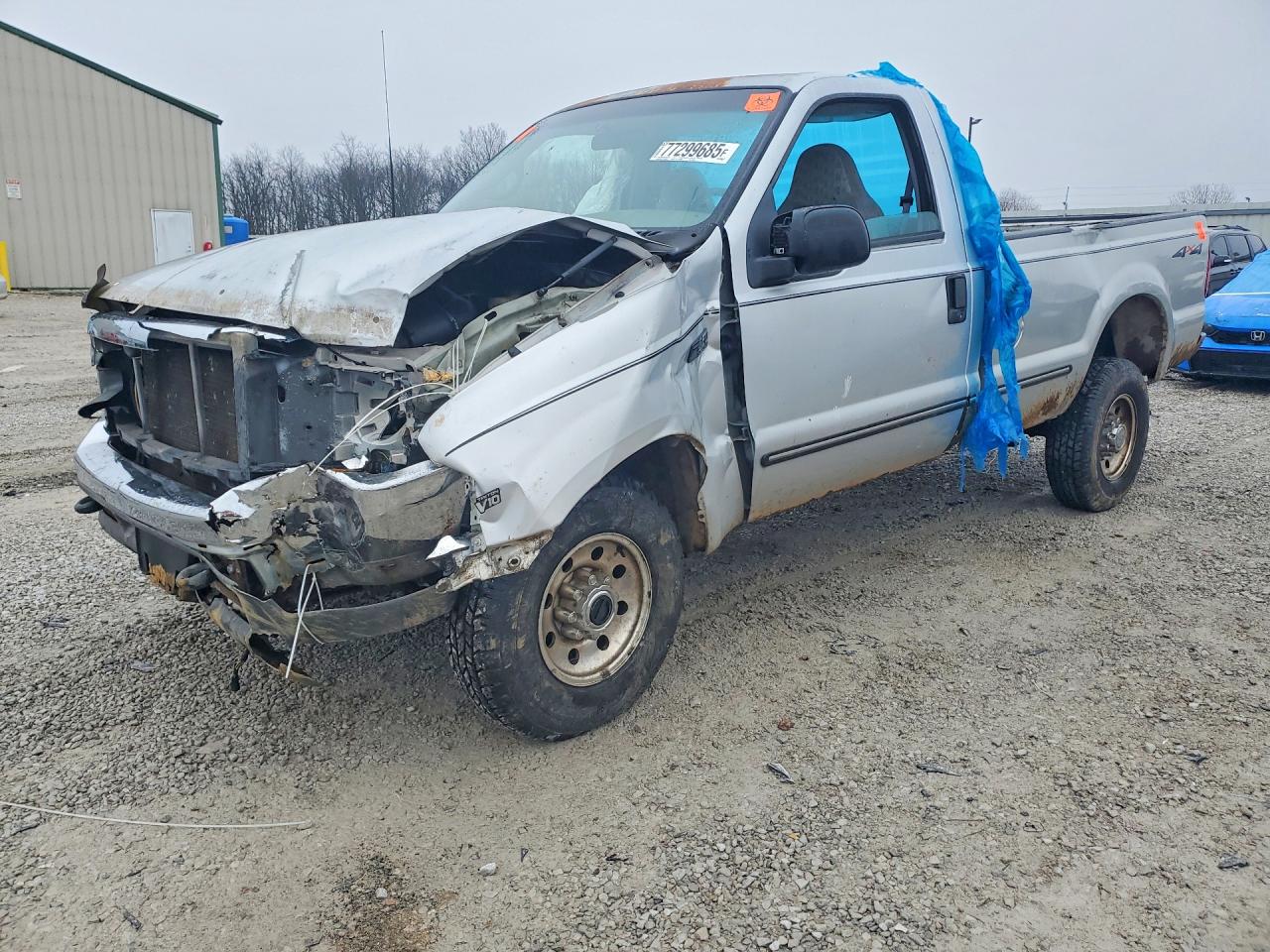 1999 Ford F250 VIN 1FTNF21S3XEB34658 photo 1