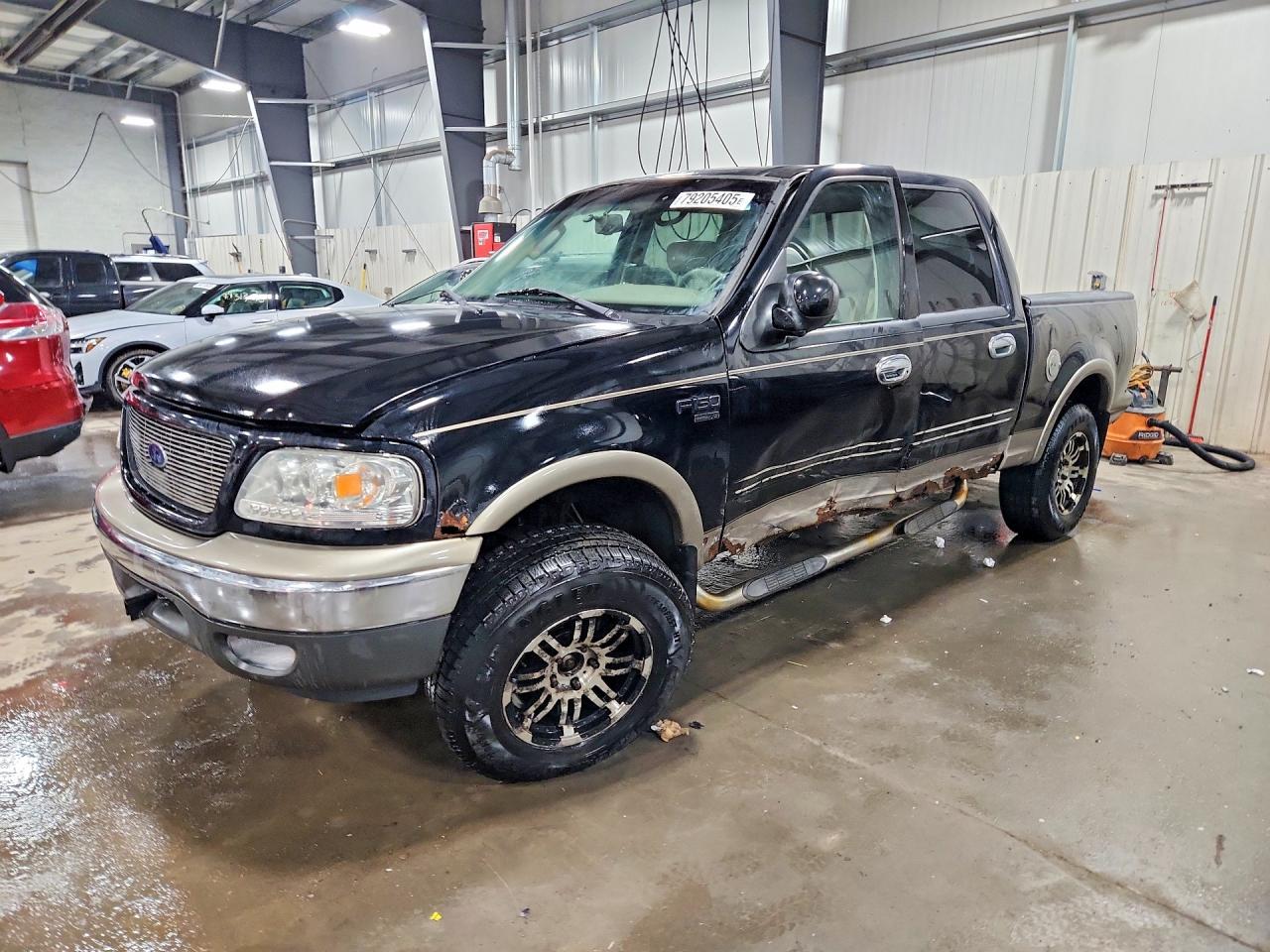2003 Ford F150 VIN 1FTRW08L13KD57927 photo 1