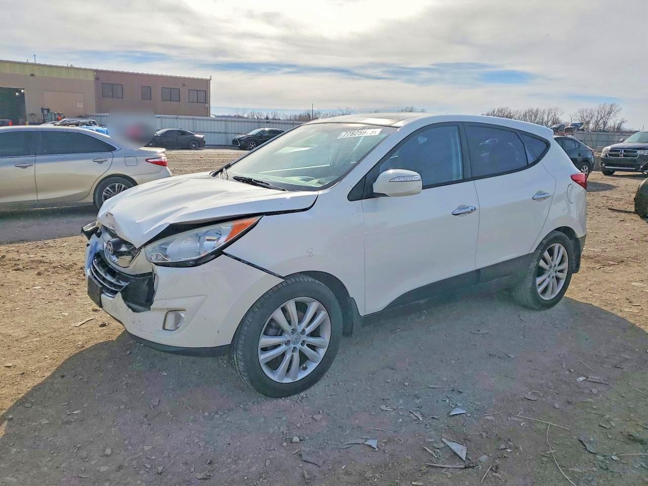 2013 HYUNDAI Tucson VIN KM8JUCAC4DU663570 photo 1