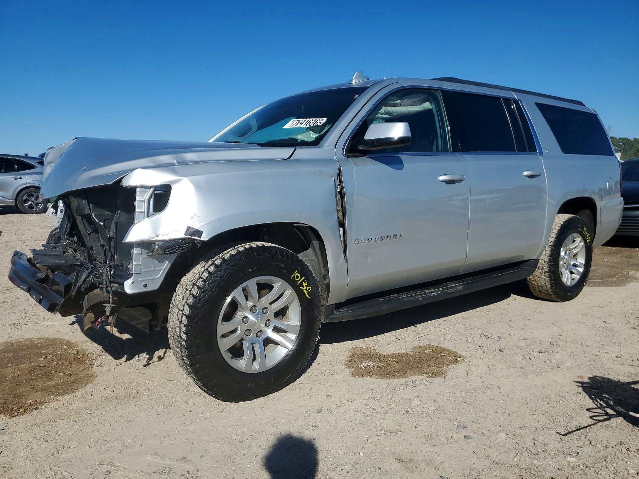 2019 Chevrolet Suburban VIN 1GNSKHKC2KR394535 photo 1
