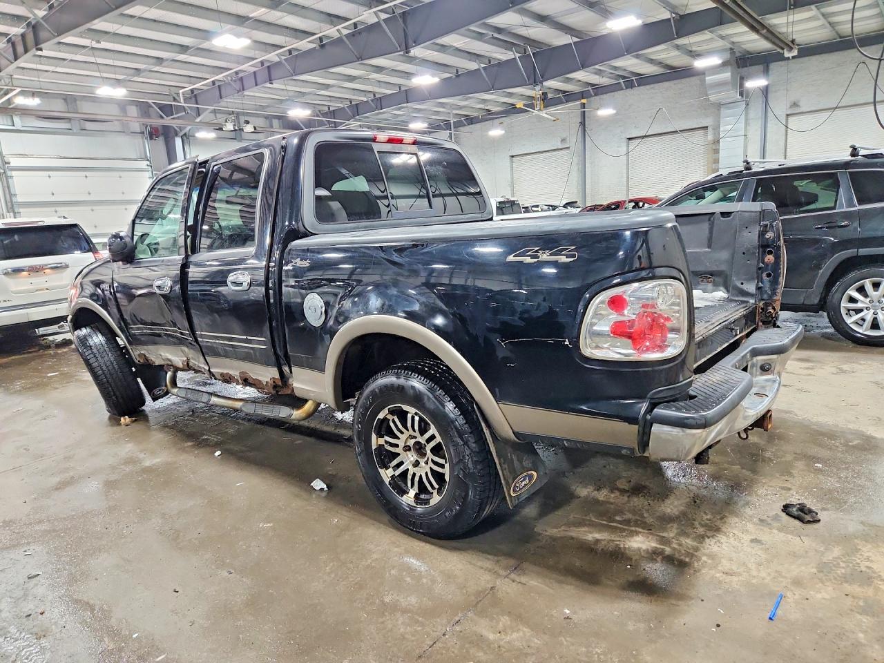2003 Ford F150 VIN 1FTRW08L13KD57927 photo 2