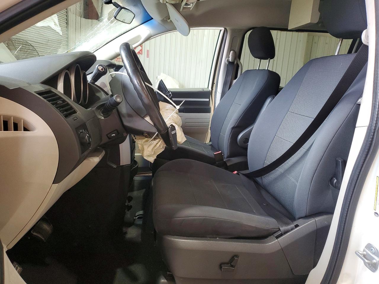 2009 Dodge Caravan VIN 2D8HN54159R590141 photo 7