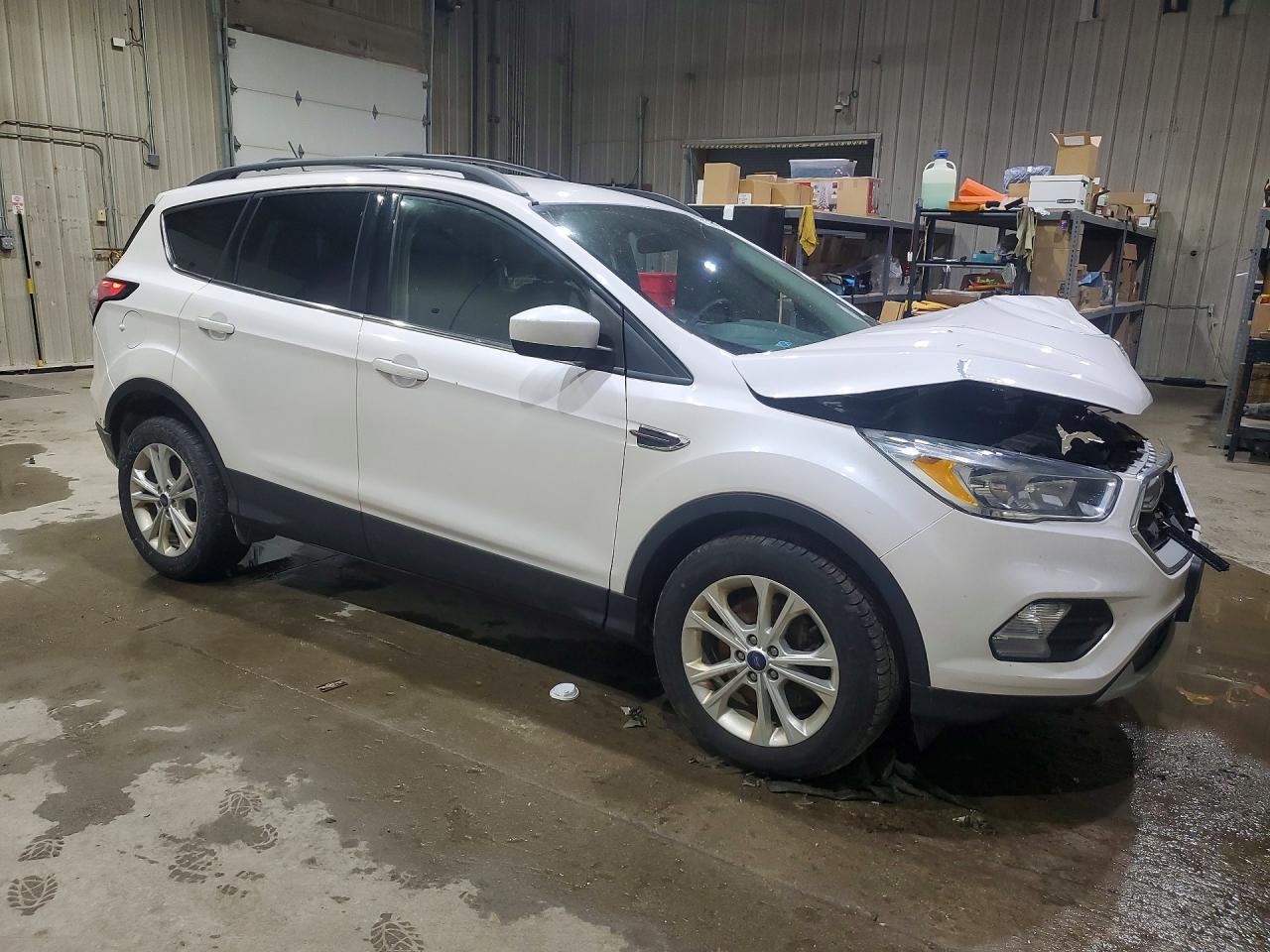 2018 Ford Escape VIN 1FMCU9GD2JUA77604 photo 4