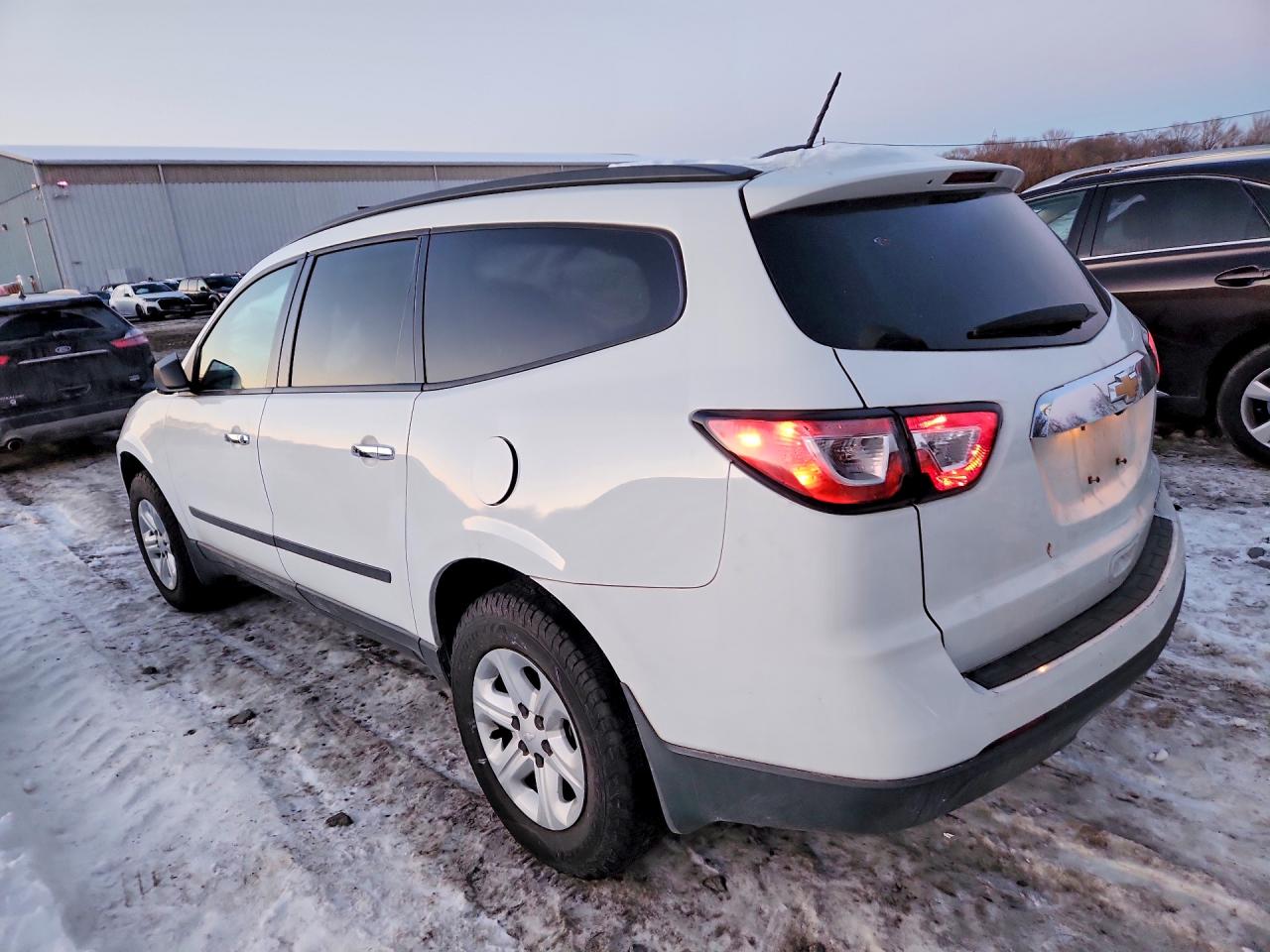 2016 Chevrolet Traverse VIN 1GNKRFED4GJ137273 photo 2