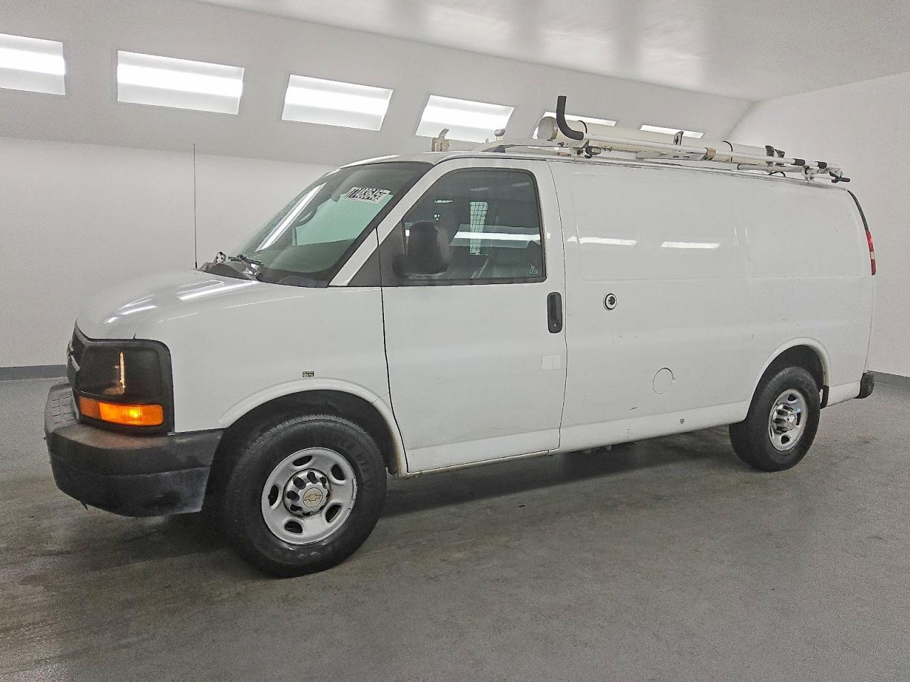 2013 CHEV Express VIN 1GCWGFCB1D1902405 photo 1