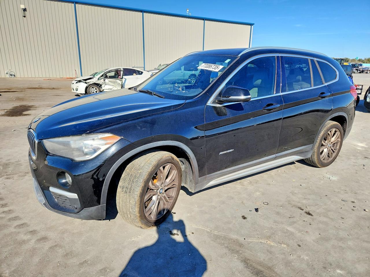 2017 BMW X1 VIN WBXHT3C37H5F87044 photo 1