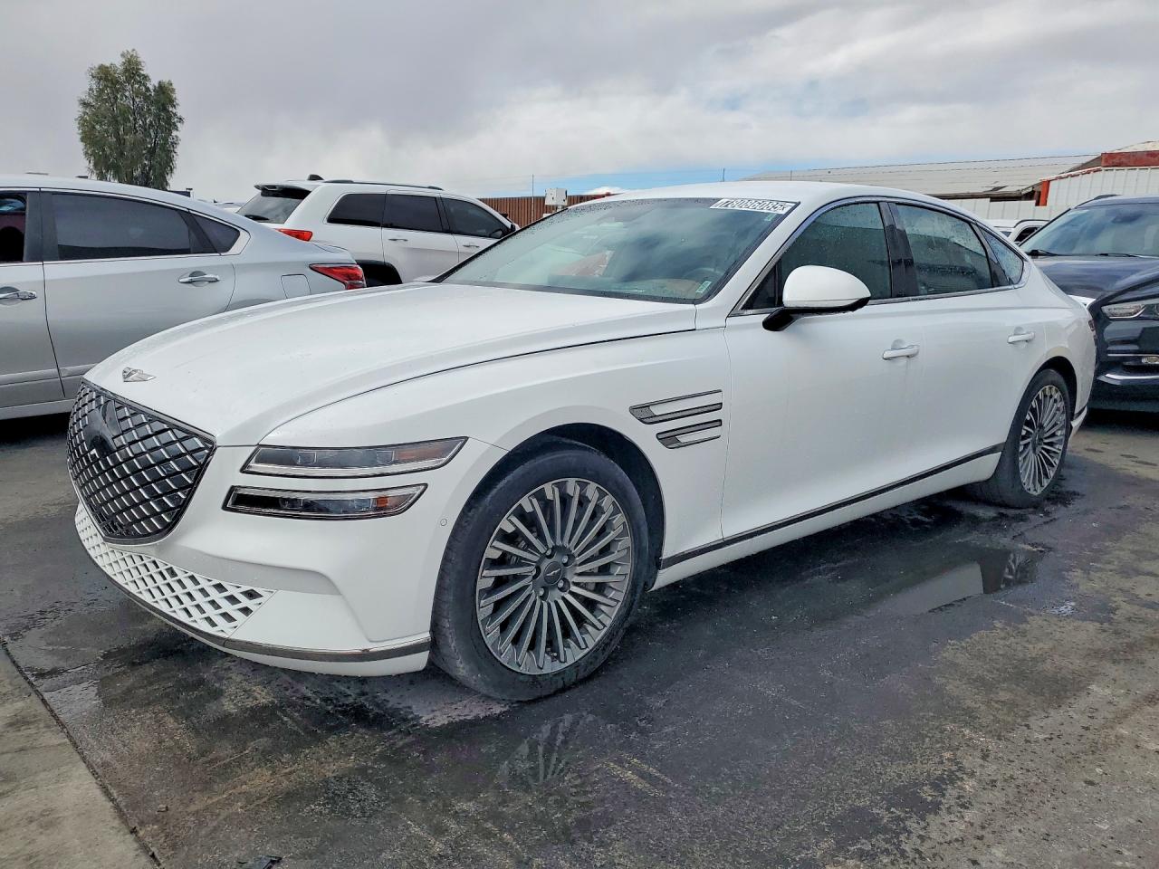 2023 Genesis G80 VIN KMTGE4S10PU004213 photo 1
