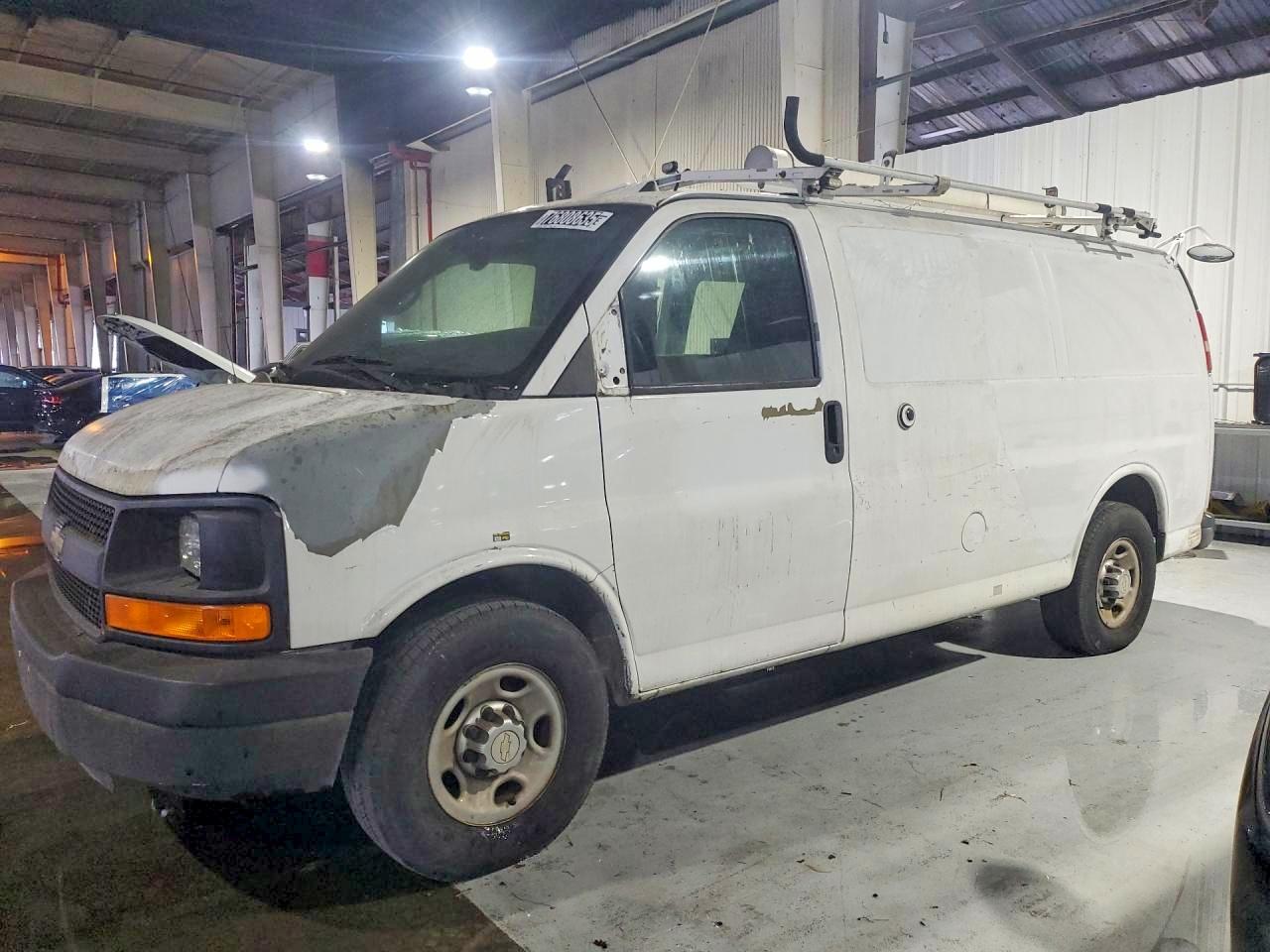 2012 CHEV Express VIN 1GCWGFCB8C1123713 photo 1