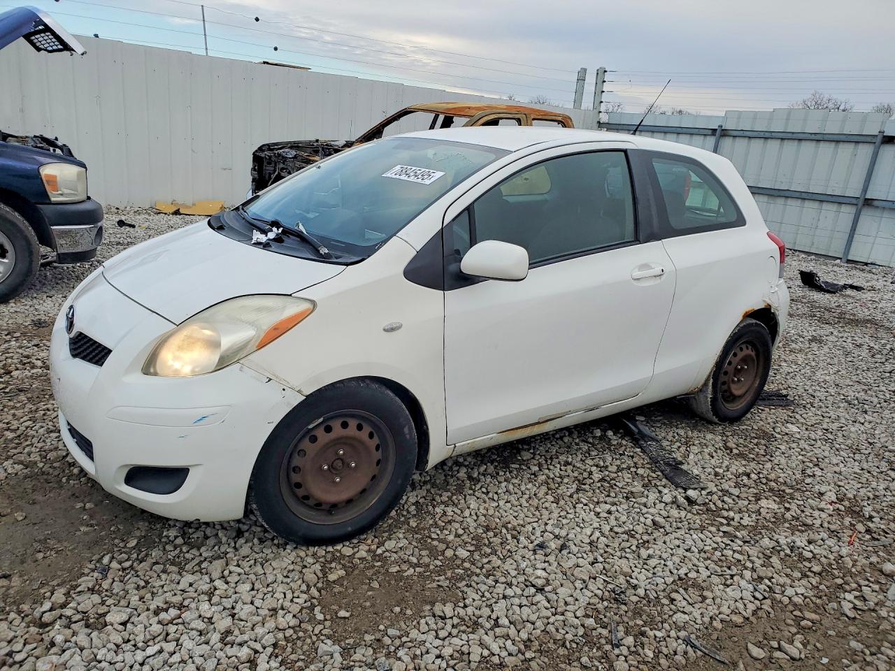 2009 Toyota Yaris VIN JTDJT903395258524 photo 1