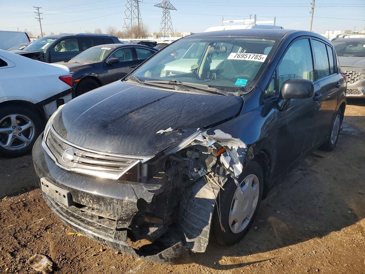2010 NISS Versa VIN 3N1BC1CP9AL385371 photo 1