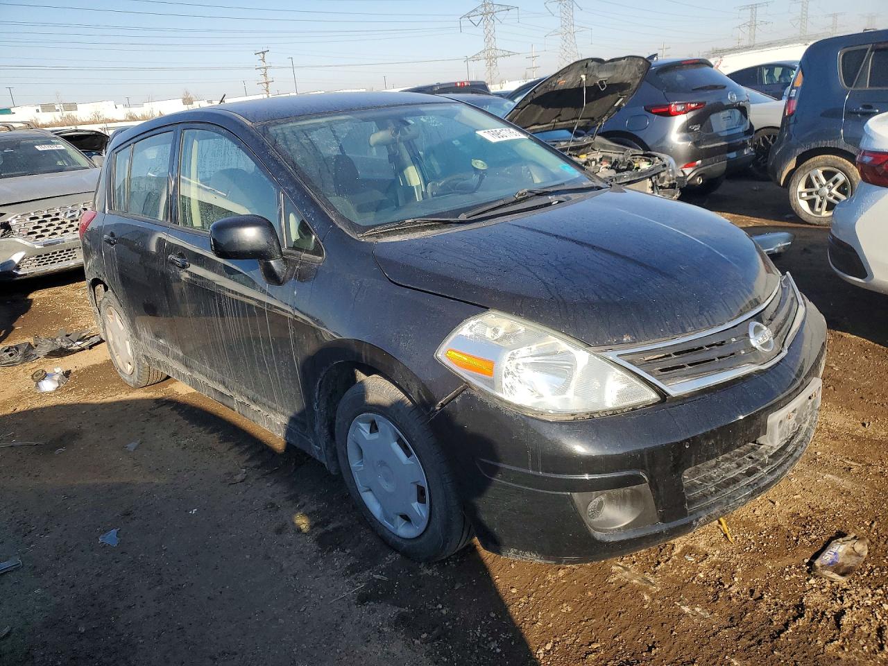 2010 NISS Versa VIN 3N1BC1CP9AL385371 photo 4