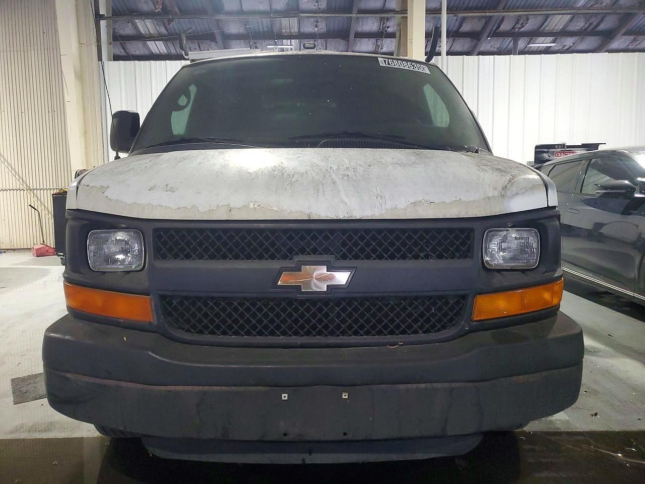 2012 CHEV Express VIN 1GCWGFCB8C1123713 photo 5
