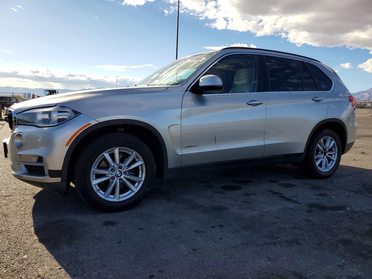 2014 BMW X5 VIN 5UXKR2C50E0H33935 photo 1