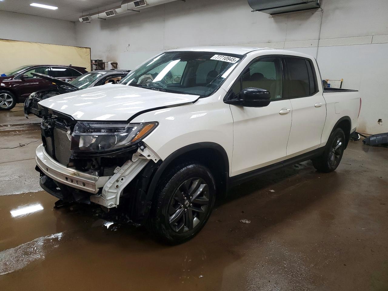 2021 Honda Ridgeline VIN 5FPYK3F11MB003079 photo 1