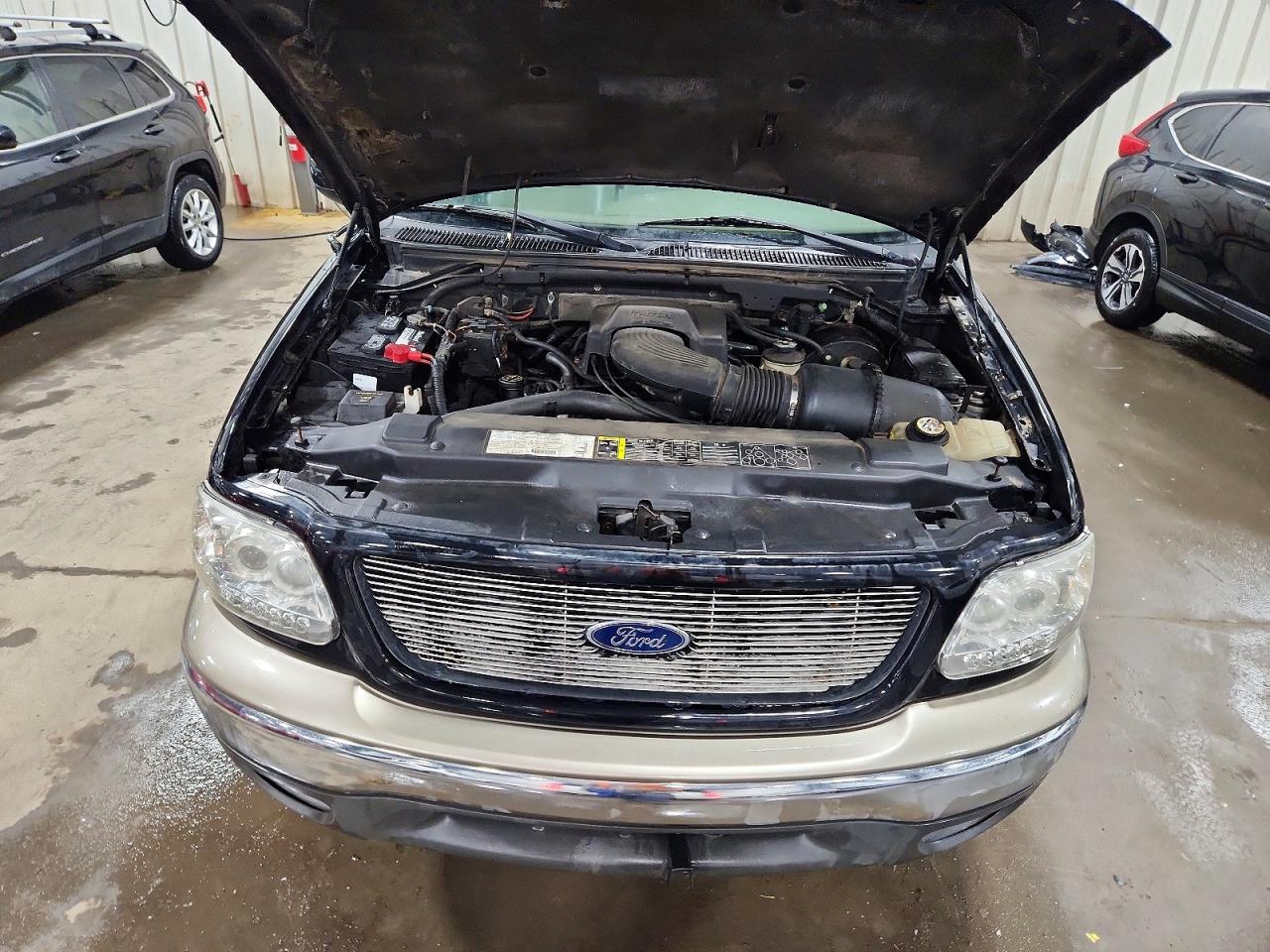 2003 Ford F150 VIN 1FTRW08L13KD57927 photo 11