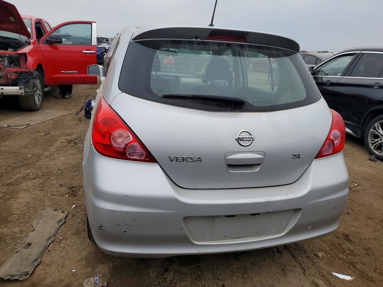 2010 NISS Versa VIN 3N1BC1CP0AL385601 photo 6