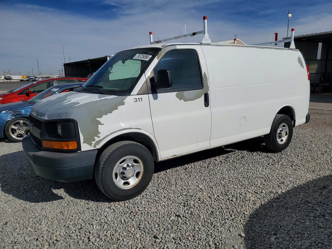 2011 Chevrolet Express VIN 1GCWGFCA0B1189078 photo 1