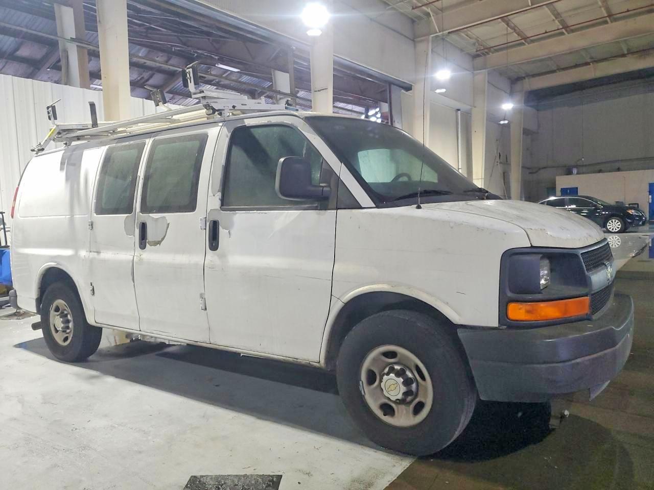 2012 CHEV Express VIN 1GCWGFCB8C1123713 photo 4