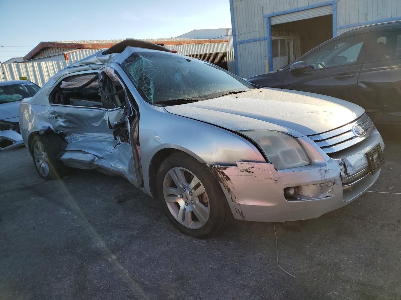 2009 Ford Fusion VIN 3FAHP08149R217601 photo 4