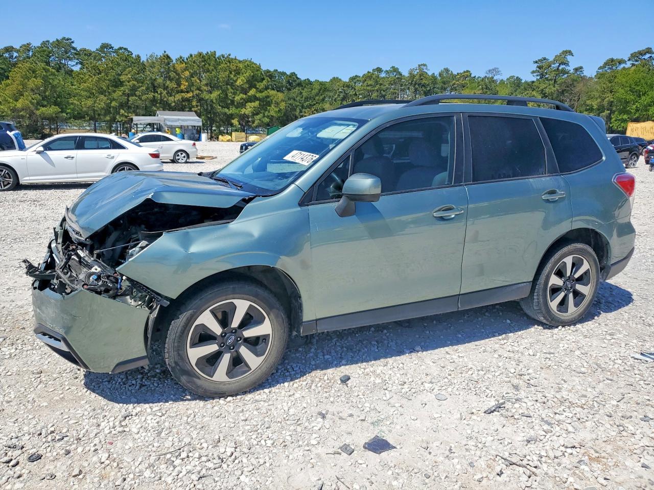 2018 Subaru Forester VIN JF2SJAEC9JH561140 photo 1