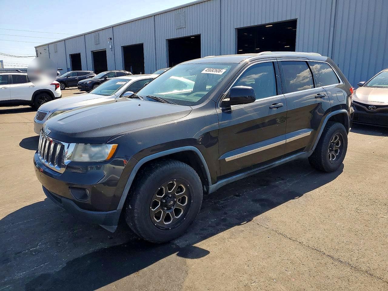 2011 Jeep Cherokee VIN 1J4RS4GG2BC573408 photo 1
