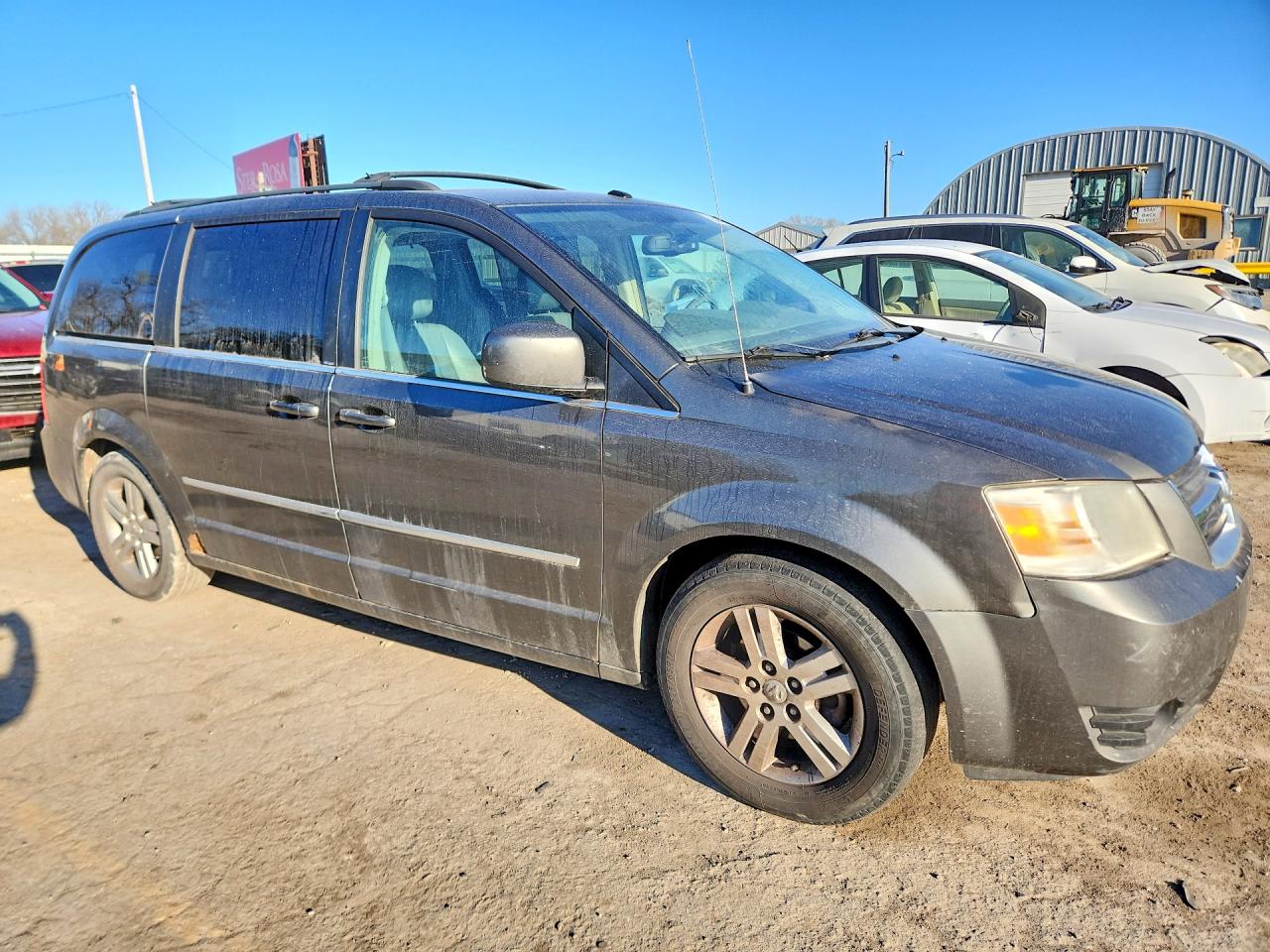 2010 Dodge Caravan VIN 2D4RN5DX8AR390403 photo 4