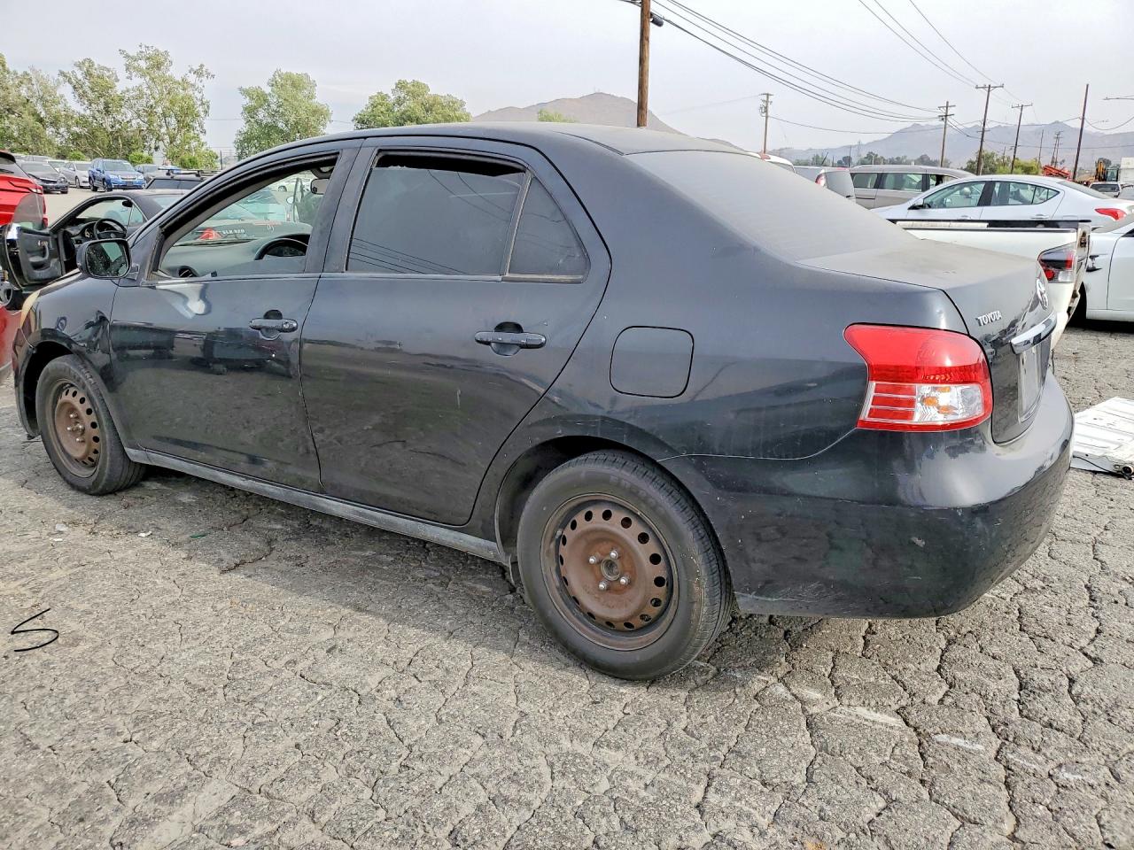 2009 TOYOTA Yaris VIN JTDBT903894055543 photo 2
