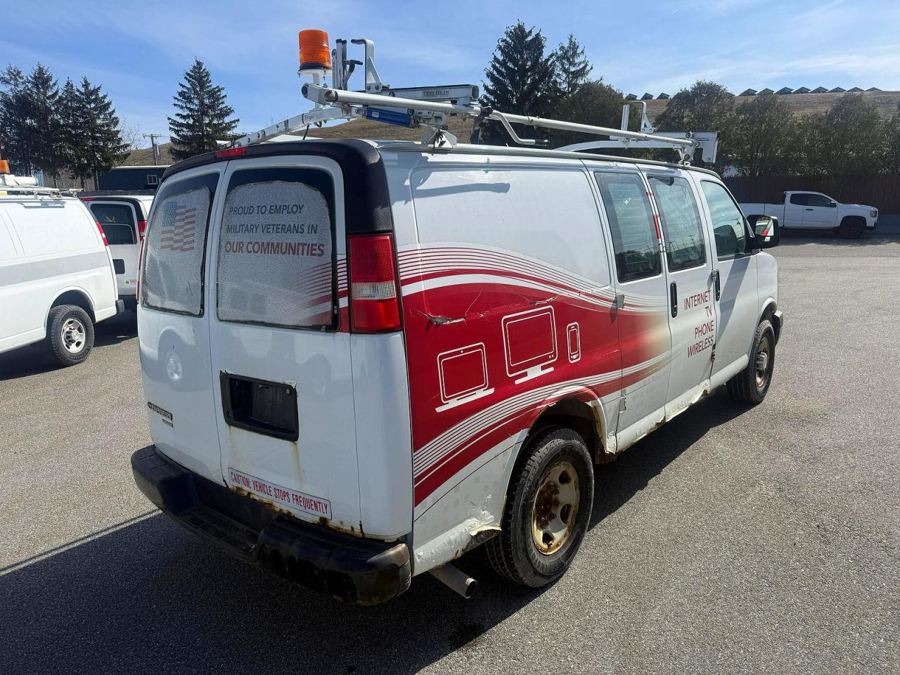 2015 CHEV Express VIN 1GCWGFCF7F1268555 photo 4