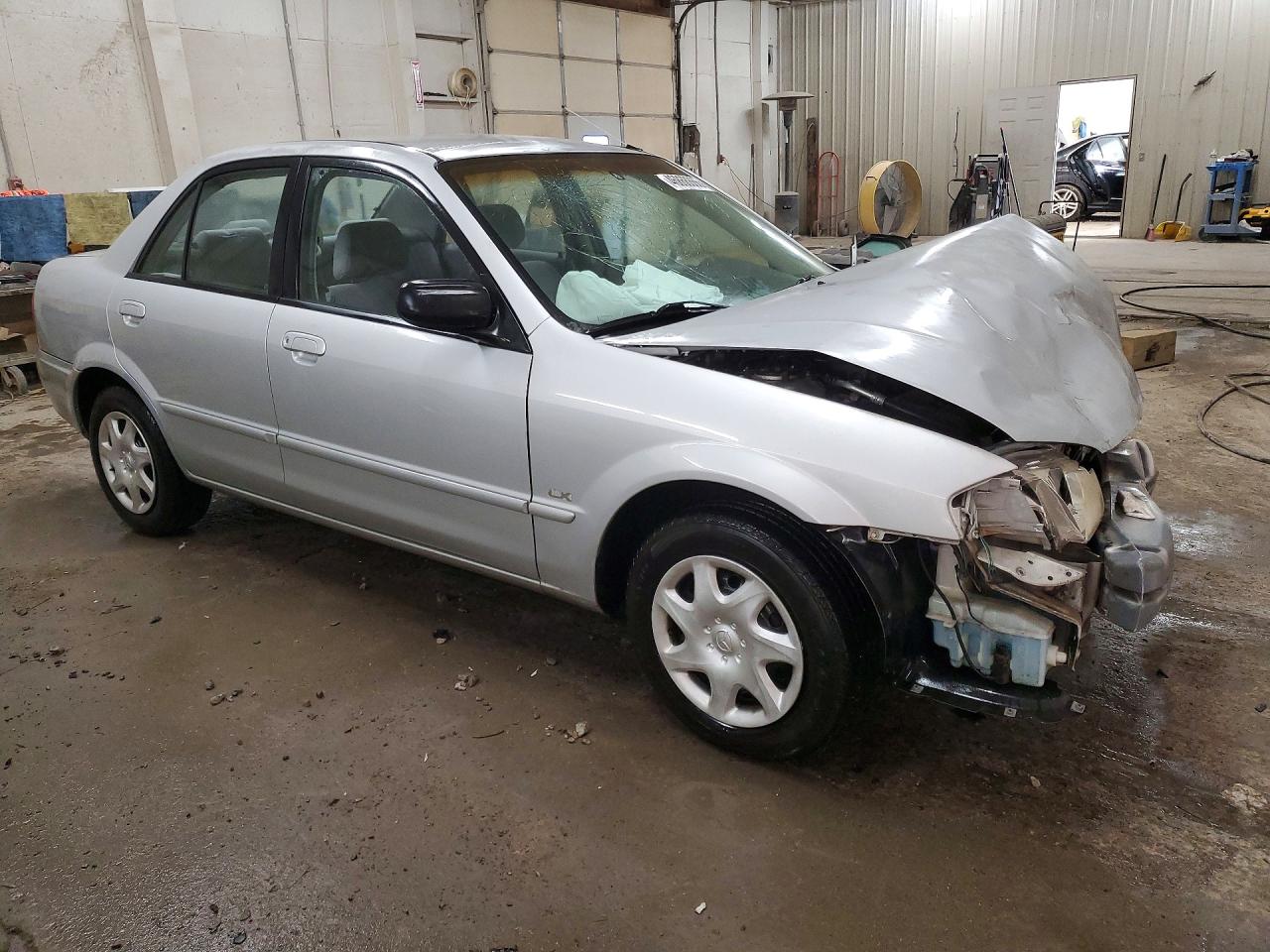 2000 Mazda Protege VIN JM1BJ222XY0297516 photo 4