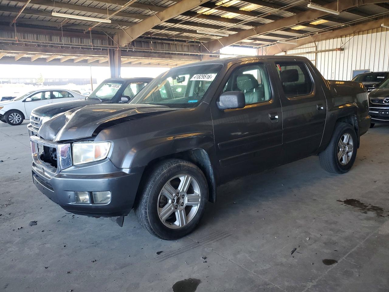 2012 Honda Ridgeline VIN 5FPYK1F54CB001008 photo 1