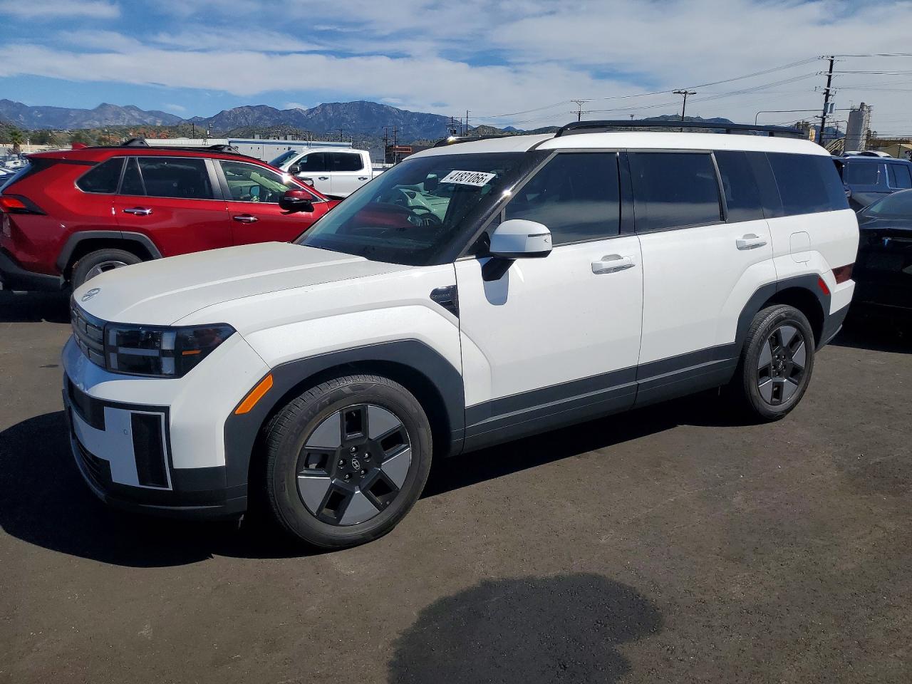 2024 Hyundai Santa fe hybrid VIN 5NMP24G11RH003193 photo 1