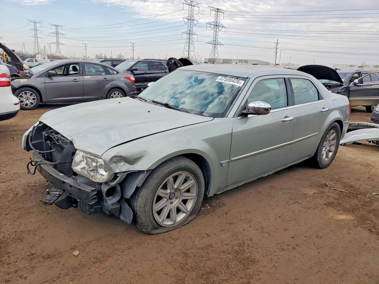 2005 Chrysler 300 VIN 2C3AA63H15H679273 photo 1