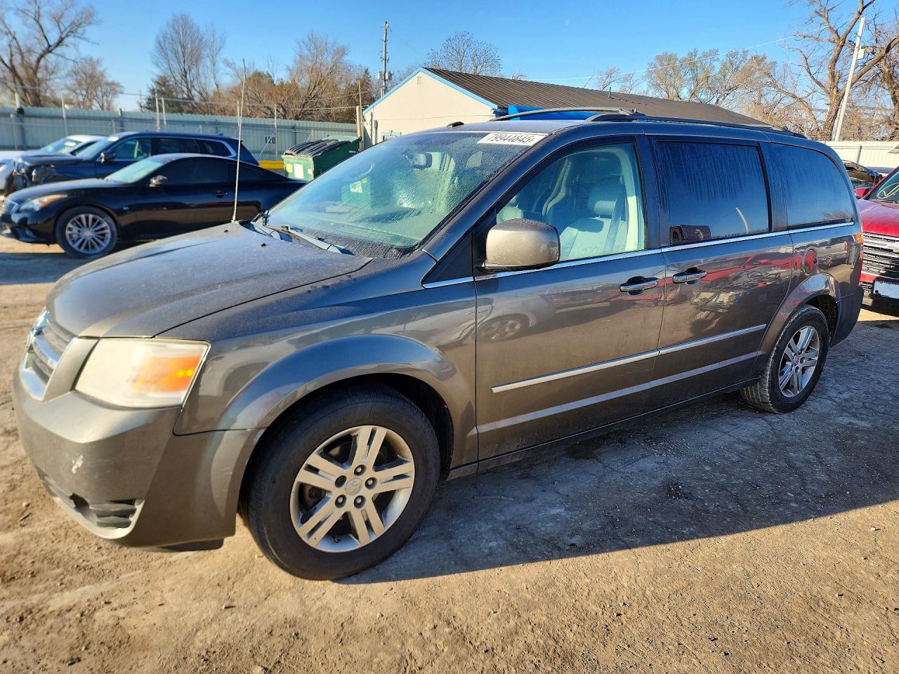 2010 Dodge Caravan VIN 2D4RN5DX8AR390403 photo 1