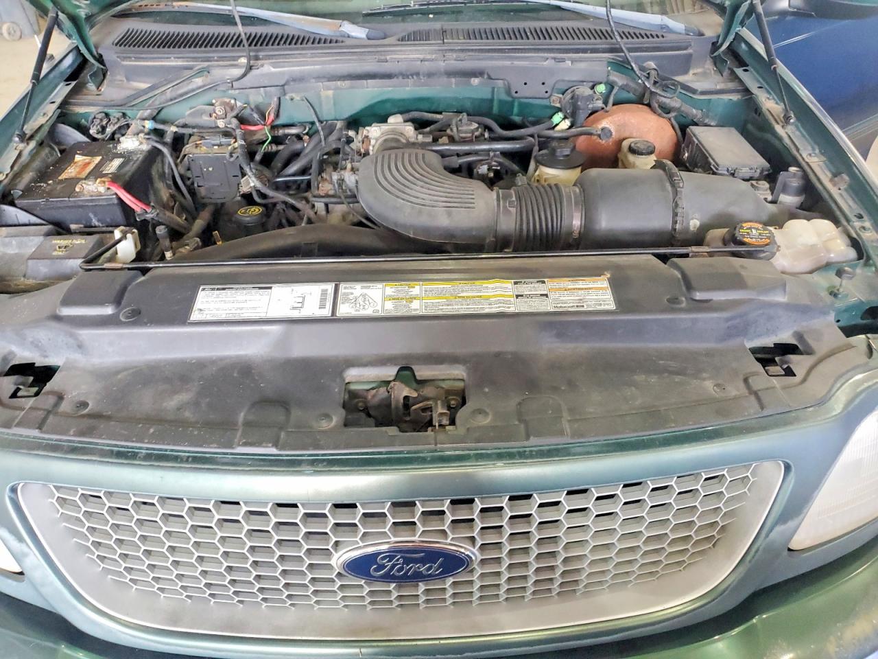 1999 Ford F150 VIN 1FTRX18L1XNA06068 photo 11